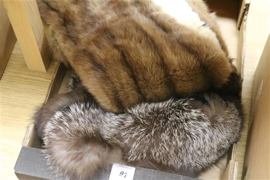 A mink and ermine stole and a fox cape